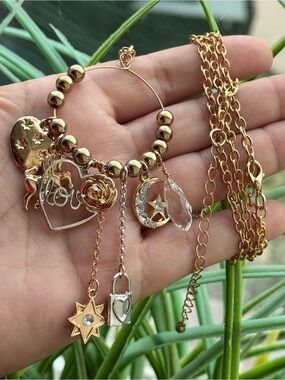 Decree Gold-Tone Layered Charm Necklace with Hearts & Crystals